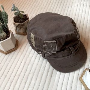 Brown hat with patchwork details - one size.